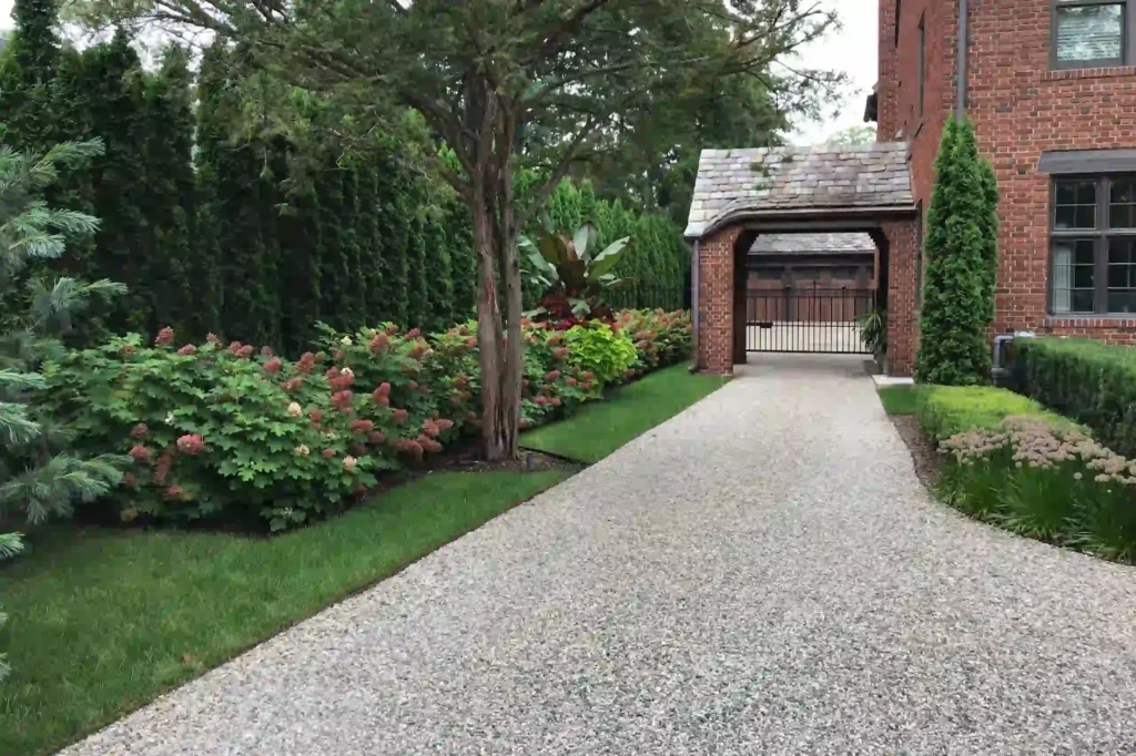 High-quality crushed stone used as a stable base for a residential driveway installation.